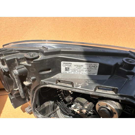 Left headlight xenon adaptiv Volvo V40 31283332